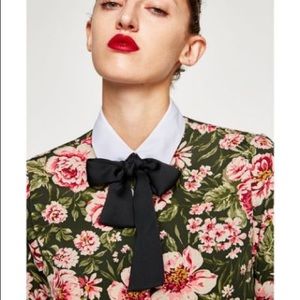 Pearl button blouse with bow